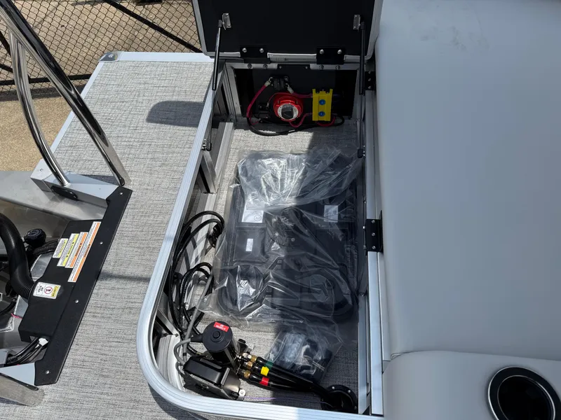 Slide: The Image of 2025 Avalon LSZ Versatile Rear Bench storage compartment with equipment and wiring. - 38