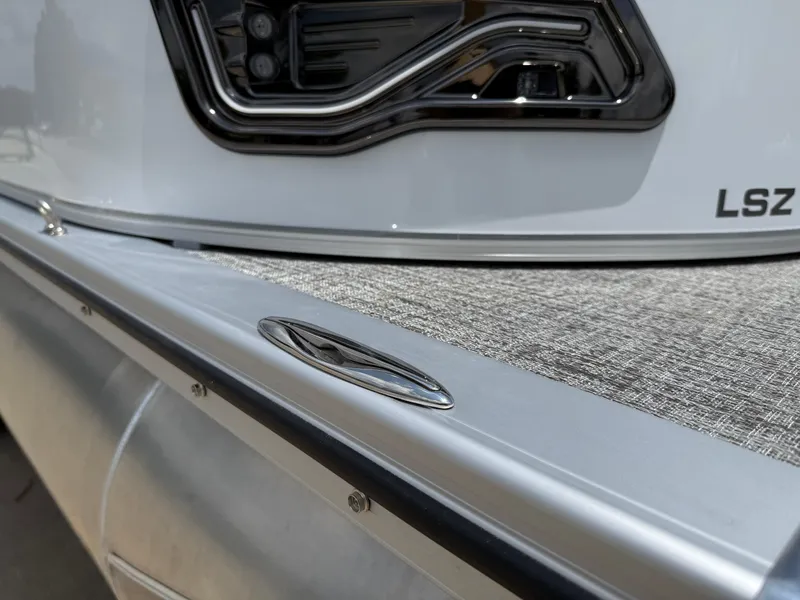 Slide: The Image of 2025 Avalon LSZ Versatile Rear Bench boat detail, featuring sleek design and modern finishes. - 42