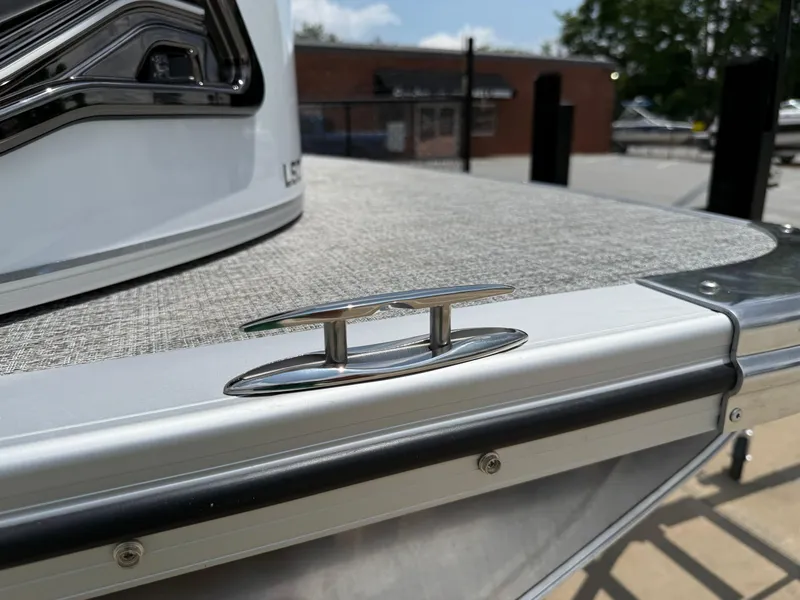 Slide: The Image of 2025 Avalon LSZ Versatile Rear Bench boat detail with cleat on deck. - 43