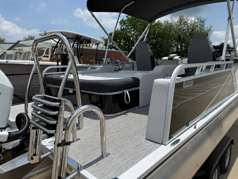 Slide: The Image of 2025 Avalon LSZ Versatile Rear Bench pontoon boat with sleek design and comfortable seating. - 45