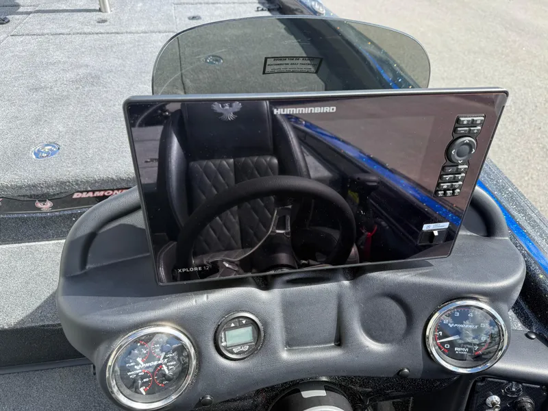 Slide: The Image of Dashboard of a 2026 Phoenix 919 ZXL boat with Humminbird electronics. - 12