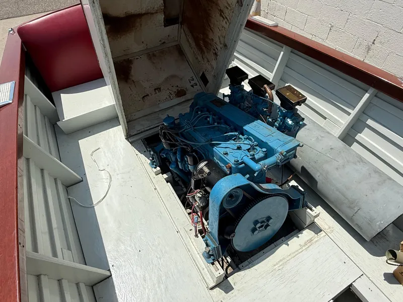 Slide: The Image of 1953 Chris-Craft 17’ Sportsman boat engine, open compartment, vintage marine design. - 14