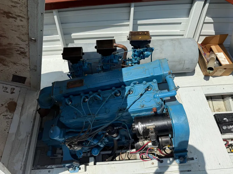 Slide: The Image of 1953 Chris-Craft 17’ Sportsman engine, blue, detailed view in boat compartment. - 16
