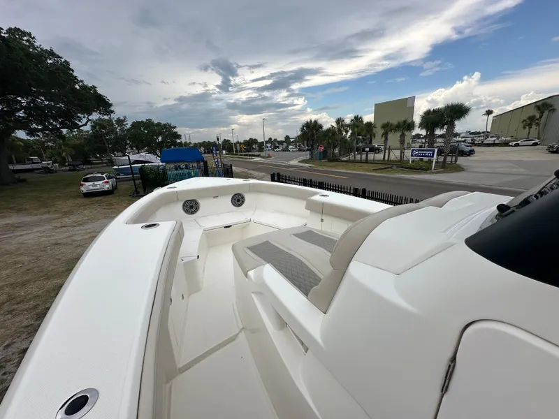 Slide: The Image of 2024 Solace 32 CS boat on water, showcasing sleek design and modern features. - 3