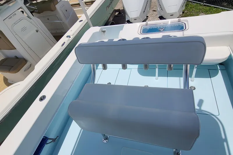 Slide: The Image of 2023 Contender 25 Tournament boat interior with seating and rod holders. - 15