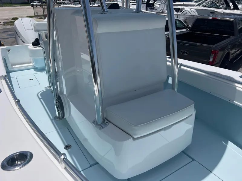 Slide: The Image of 2023 Contender 25 Tournament boat interior with seating and console, showcasing sleek design. - 17