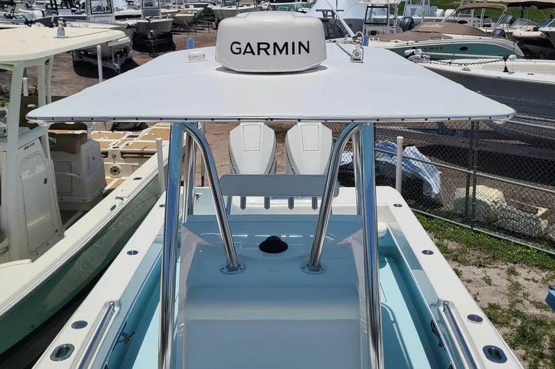 Slide: The Image of 2023 Contender 25 Tournament boat with Garmin equipment, featuring sleek design and modern technology. - 21