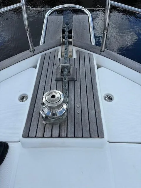 Slide: The Image of 2014 Beneteau Swift Trawler 44 bow with anchor chain and winch. - 28