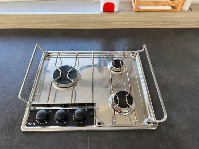 Slide: The Image of Three-burner stainless steel stove on Lagoon 42, 2024 model yacht kitchen. - 38