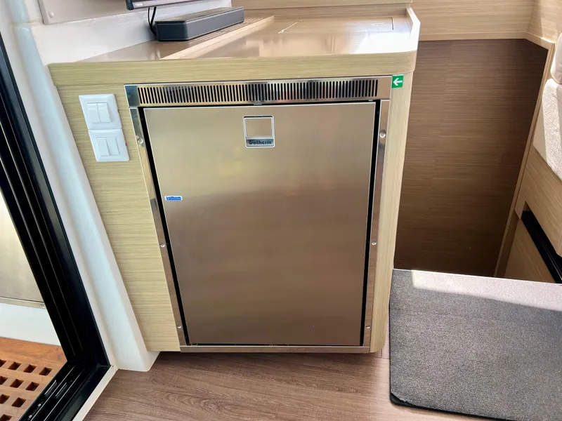 Slide: The Image of Stainless steel fridge in 2024 Lagoon 42 yacht interior. - 41