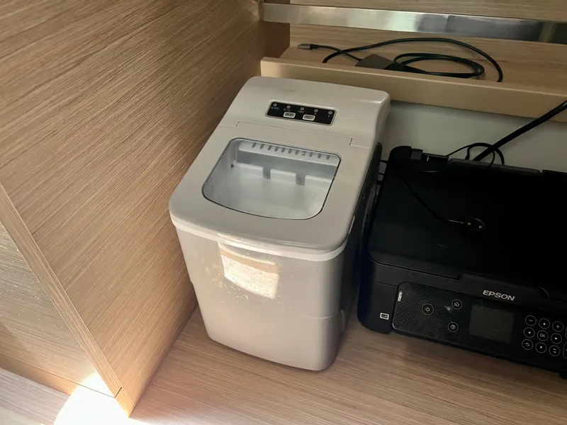 Slide: The Image of Compact ice maker and printer on Lagoon 42 yacht, 2024 model. - 42