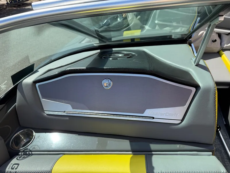 Slide: The Image of 2019 MasterCraft X22 boat interior with sleek dashboard and modern design elements. - 25