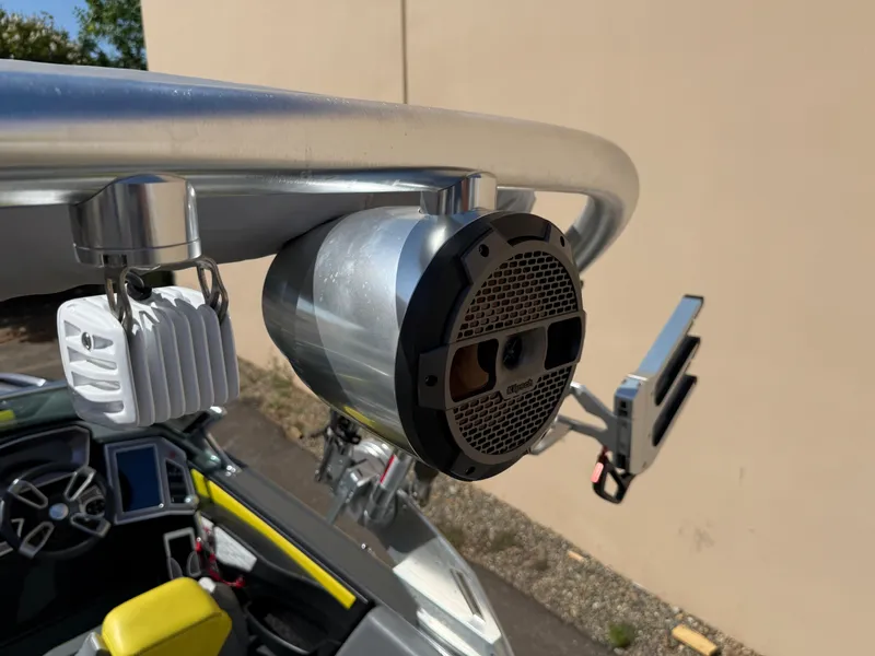 Slide: The Image of 2019 MasterCraft X22 boat with mounted speaker and accessories on the tower. - 32