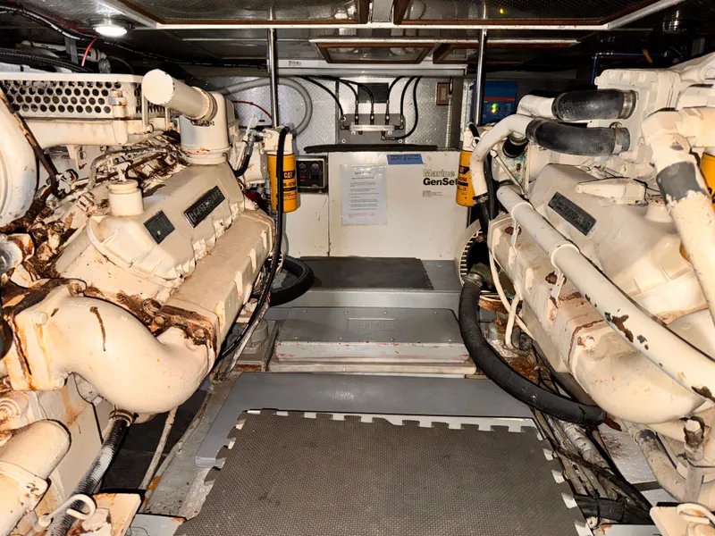 Slide: The Image of Engine room of 1988 Overseas PT52 Cockpit Motoryacht with twin engines and generator. - 27