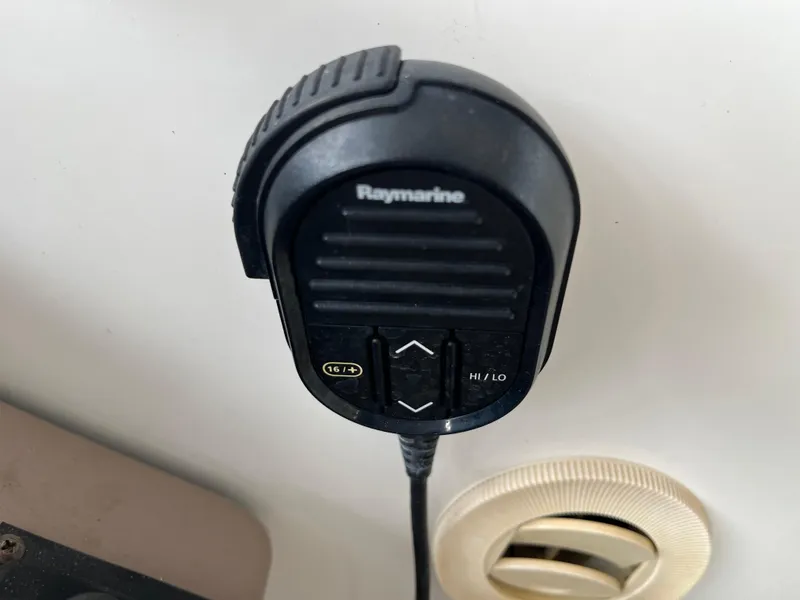 Slide: The Image of Raymarine marine radio microphone on a 2004 Regal Commodore 4260 boat. - 26