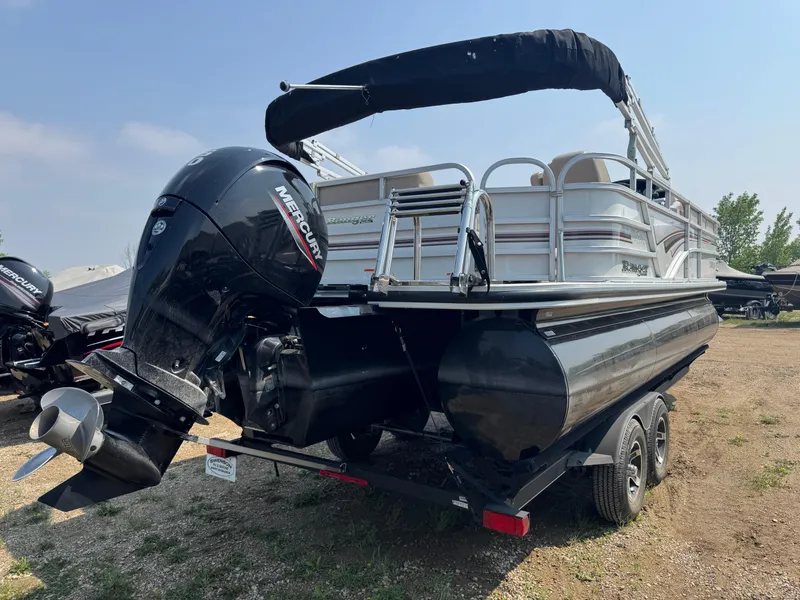 Slide: The Image of 2020 Ranger Reata 223C pontoon boat with Mercury outboard motor on trailer. - 3