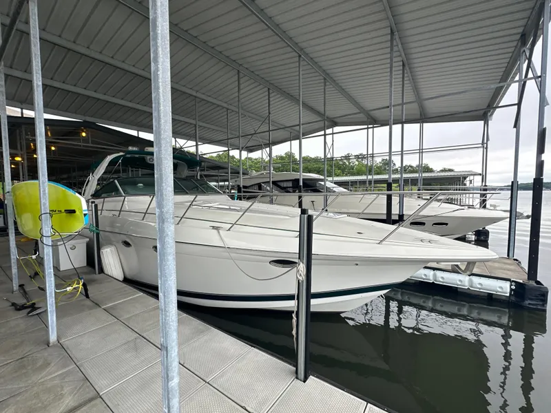 Slide: The Image of 2000 Formula 40 PC yacht docked under covered marina. - 10