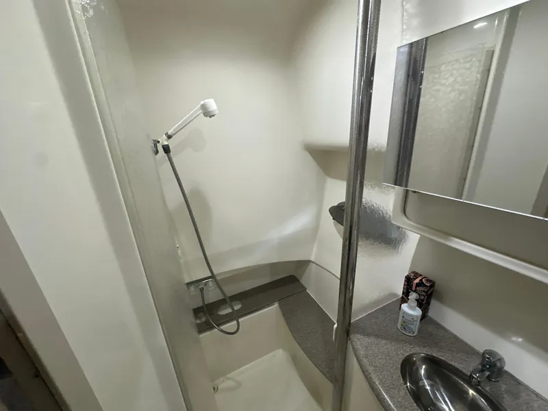 Slide: The Image of Bathroom interior of 2000 Formula 40 PC yacht with shower and sink. - 29
