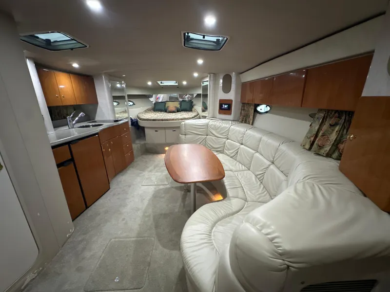 Slide: The Image of Luxurious interior of a 2000 Formula 40 PC yacht with leather seating and modern amenities. - 34