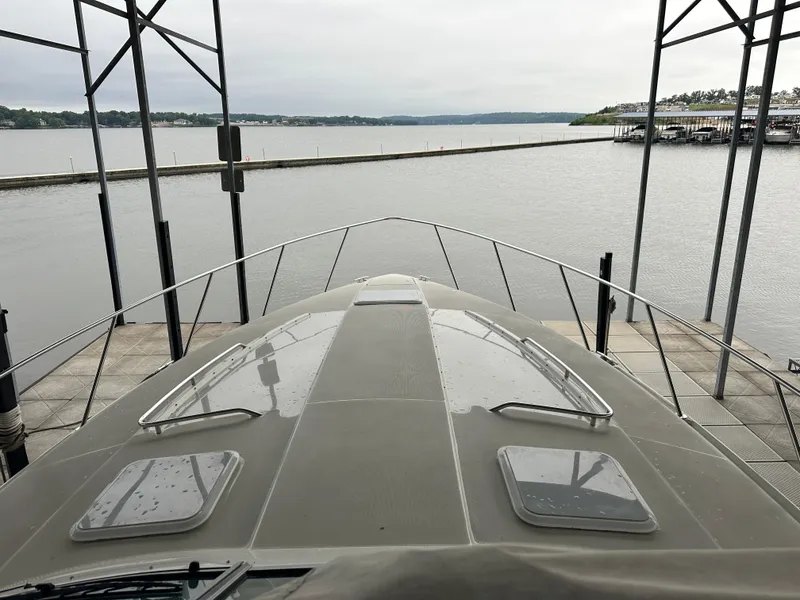 Slide: The Image of Bow view of 2000 Formula 40 PC yacht docked at a marina. - 50