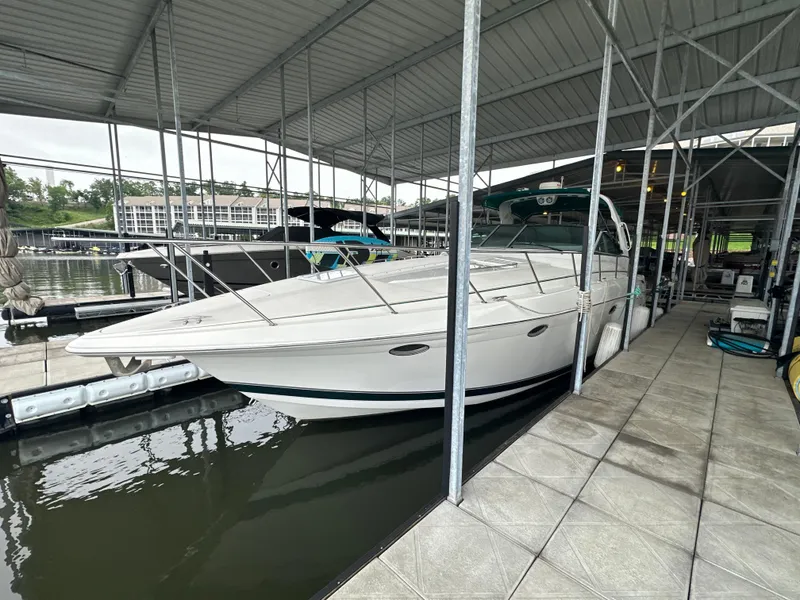 Slide: The Image of 2000 Formula 40 PC yacht docked in a covered marina slip. - 6
