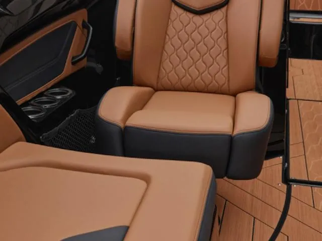 Slide: The Image of Luxurious interior seating of 2025 Yamaha Boats 255XD with tan and black upholstery. - 41