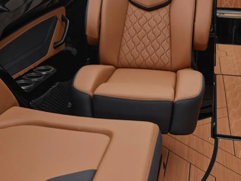 Slide: The Image of Luxurious interior seating of 2025 Yamaha Boats 255XD with elegant brown and black upholstery. - 6