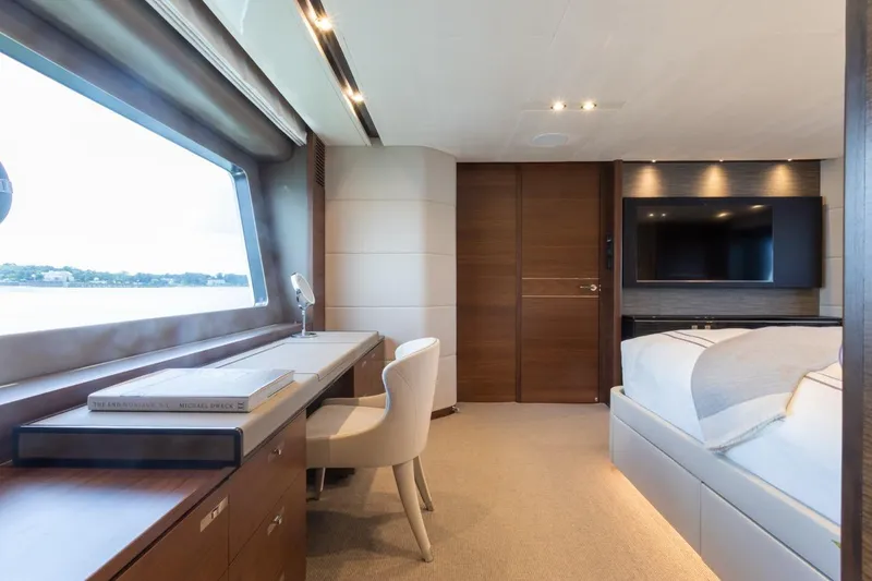Slide: The Image of Luxurious interior of 2019 Princess Y88 Motor Yacht with elegant bedroom and scenic window view. - 13