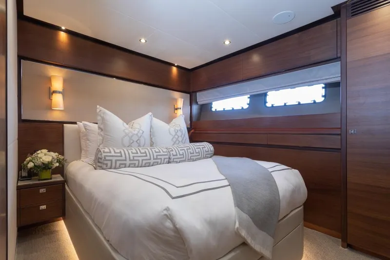 Slide: The Image of Luxurious bedroom interior on 2019 Princess Y88 Motor Yacht with elegant decor and soft lighting. - 23