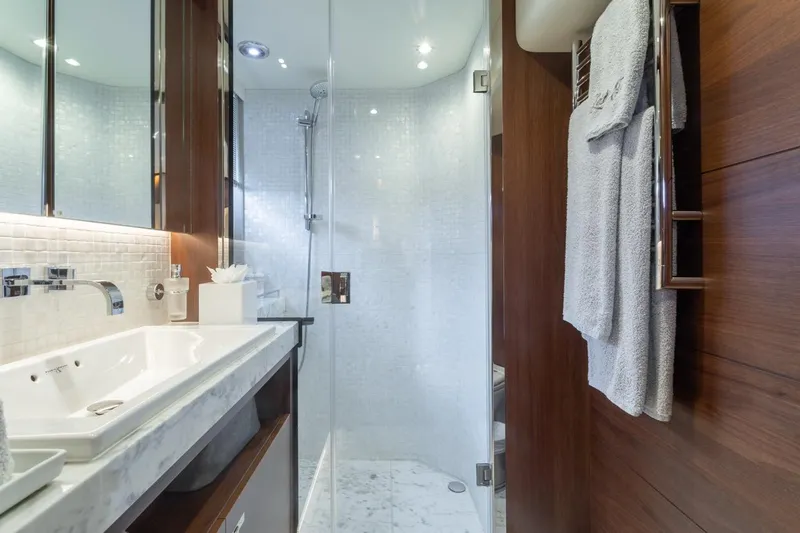 Slide: The Image of Luxurious bathroom in 2019 Princess Y88 Motor Yacht with modern fixtures and elegant design. - 24
