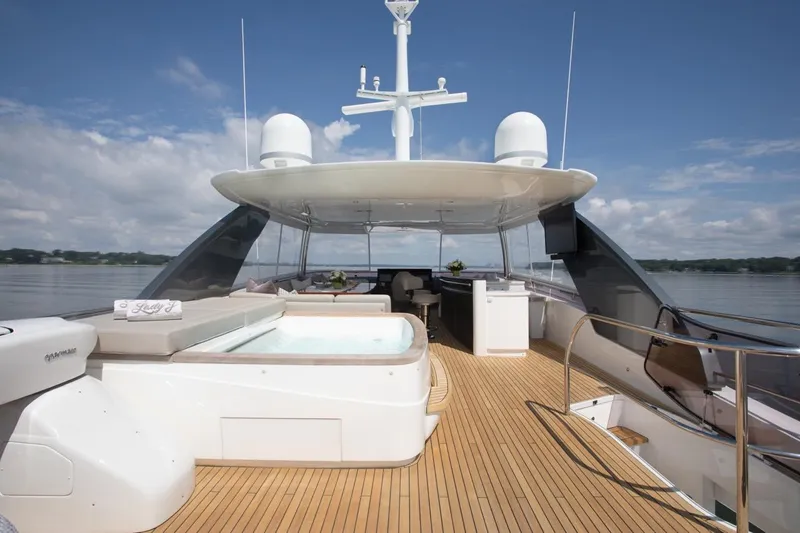 Slide: The Image of Luxurious 2019 Princess Y88 Motor Yacht deck with jacuzzi and seating area. - 34