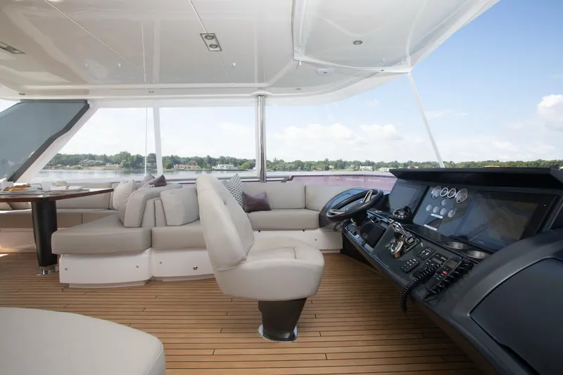 Slide: The Image of Luxurious 2019 Princess Y88 Motor Yacht interior with helm and seating area. - 39