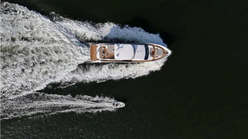 Slide: The Image of Aerial view of 2019 Princess Y88 Motor Yacht cruising on open water. - 42