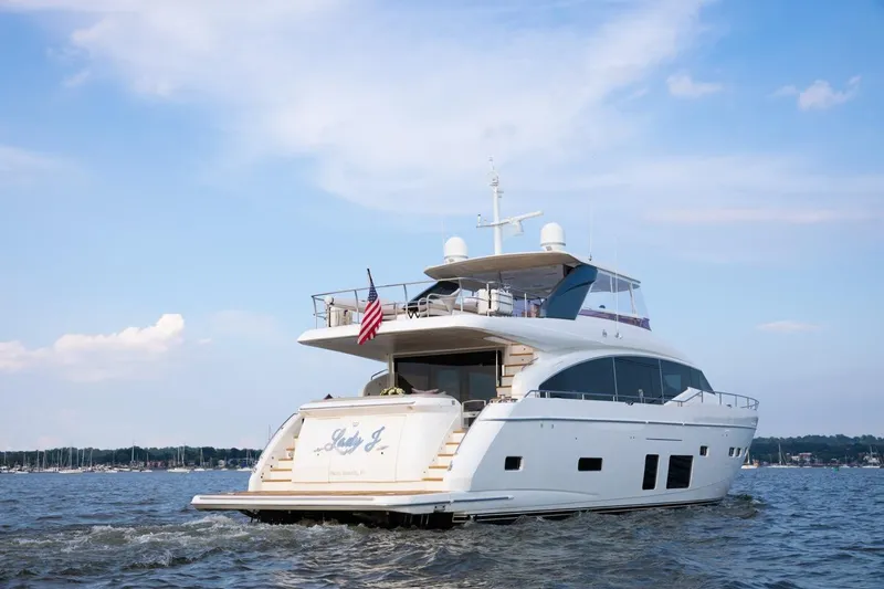 Slide: The Image of 2019 Princess Y88 Motor Yacht cruising on open water under a clear sky. - 46