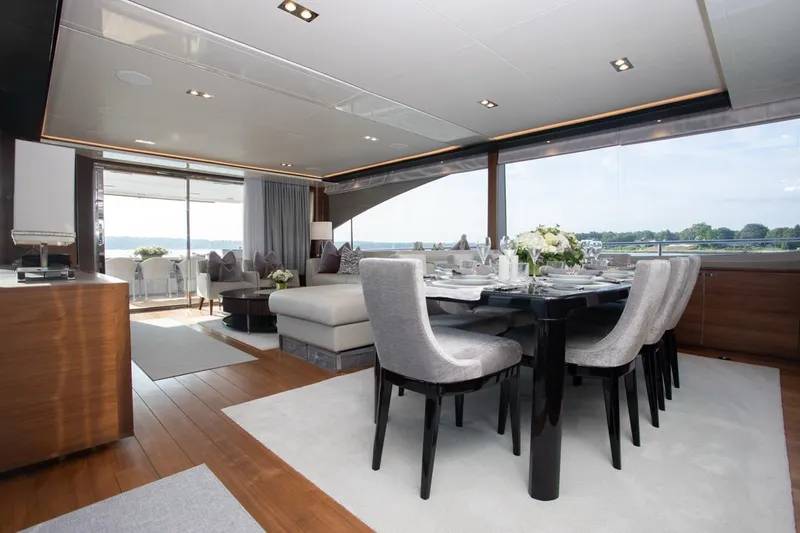 Slide: The Image of Luxurious interior of 2019 Princess Y88 Motor Yacht with elegant dining area and scenic views. - 5