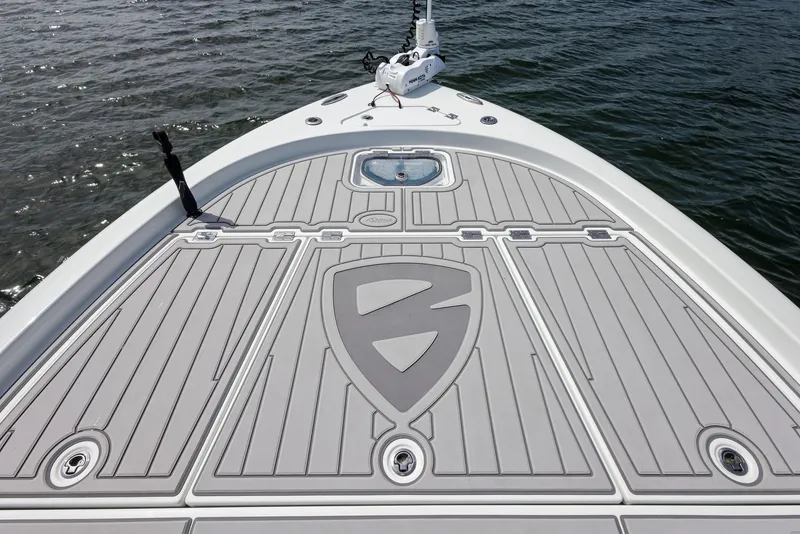 Slide: The Image of 2018 Barker Boatworks 26 Calibogue Bay deck, featuring sleek design and modern fittings. - 12