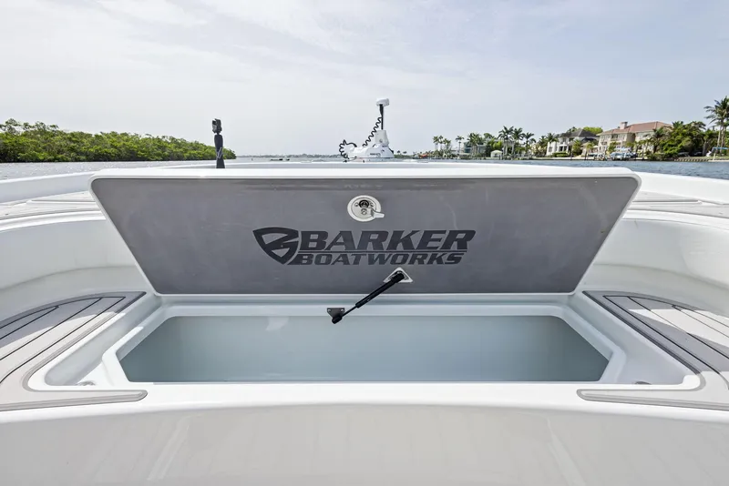 Slide: The Image of 2018 Barker Boatworks 26 Calibogue Bay, open storage compartment, scenic waterfront view. - 16