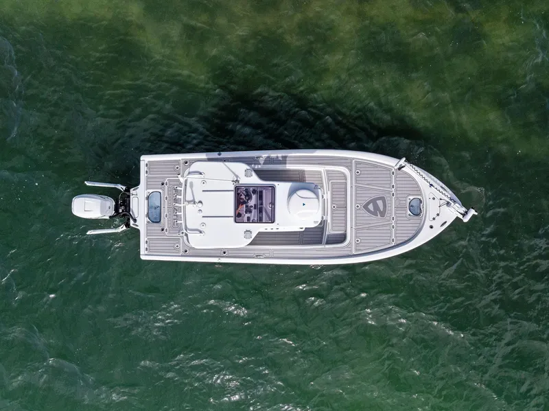Slide: The Image of Aerial view of 2018 Barker Boatworks 26 Calibogue Bay on water. - 2