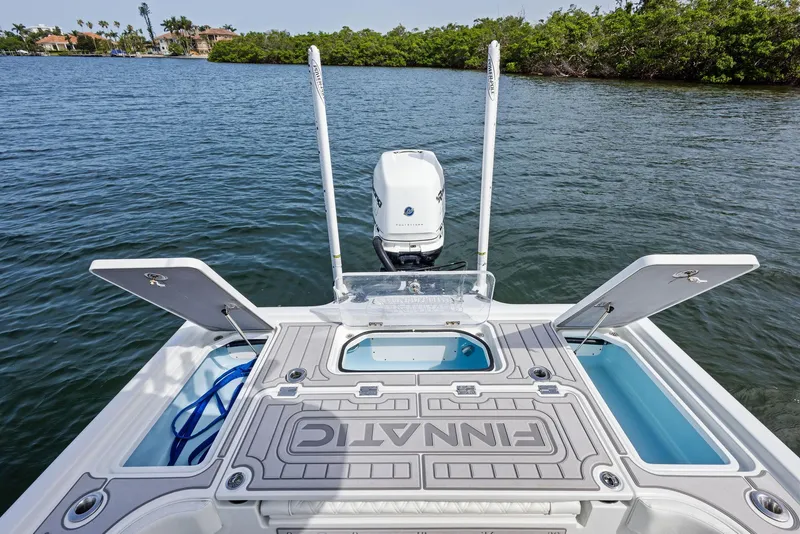 Slide: The Image of 2018 Barker Boatworks 26 Calibogue Bay on water, showcasing deck and motor. - 34