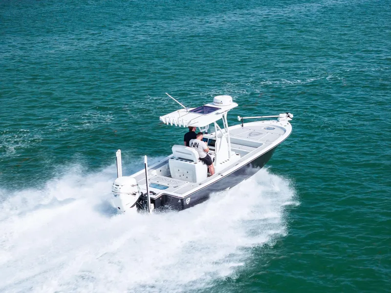 Slide: The Image of 2018 Barker Boatworks 26 Calibogue Bay cruising on open water. - 42