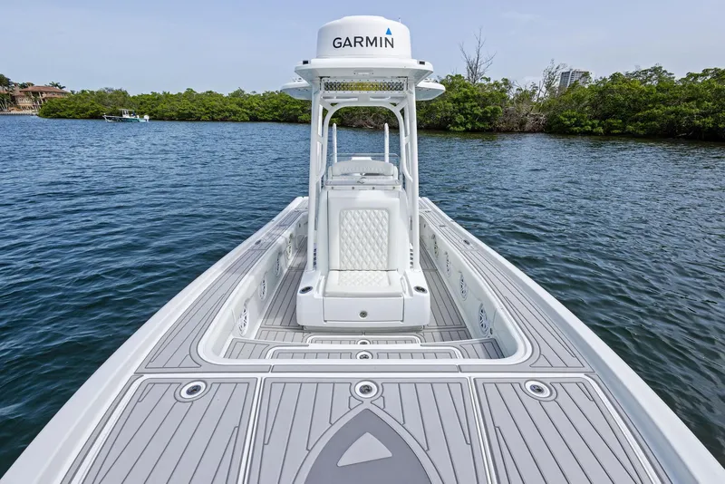 Slide: The Image of 2018 Barker Boatworks 26 Calibogue Bay on water, featuring Garmin equipment. - 19