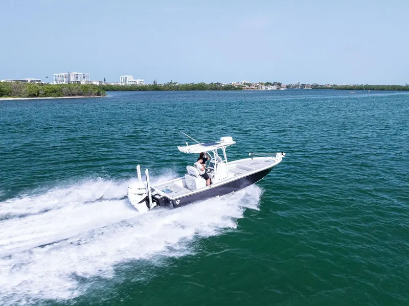 Slide: The Image of 2018 Barker Boatworks 26 Calibogue Bay cruising on open water. - 39