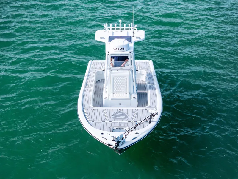 Slide: The Image of 2018 Barker Boatworks 26 Calibogue Bay on clear green water, aerial view. - 5