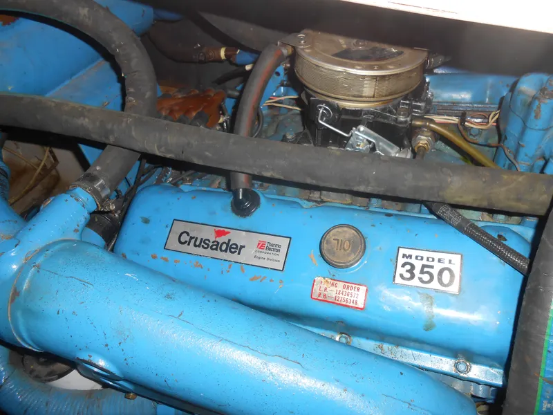 Slide: The Image of 1981 Uniflite Cabin Cruiser engine, Crusader Model 350, blue with visible hoses and components. - 20