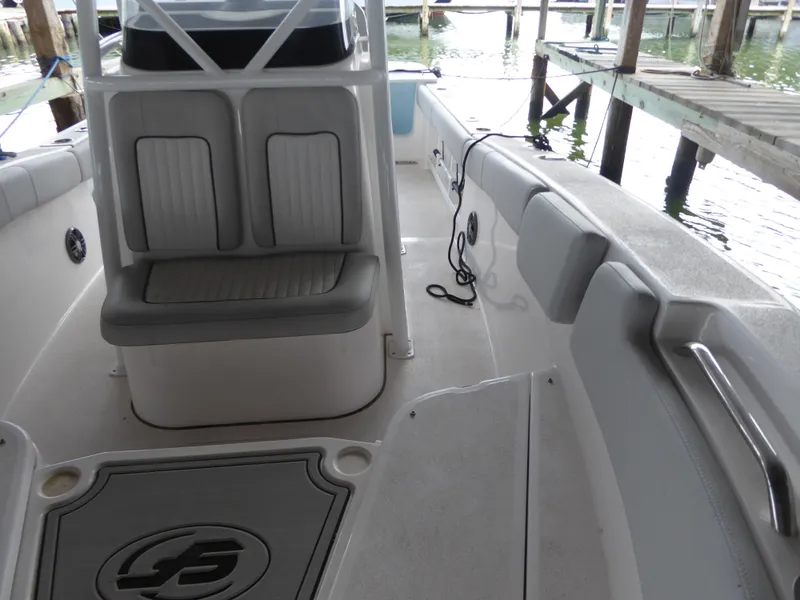 Slide: The Image of 2022 Sea Fox 248 Commander boat interior with seating and deck details. - 13