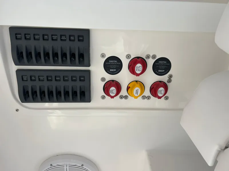 Slide: The Image of Control panel of 2024 NorthCoast 255HT boat with switches and digital relays. - 27