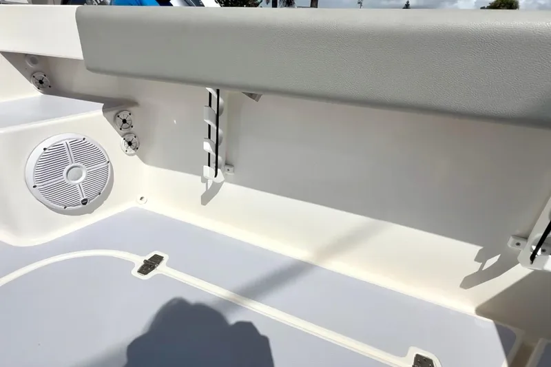 Slide: The Image of 2024 NorthCoast 255HT boat interior with speaker and seating detail. - 34