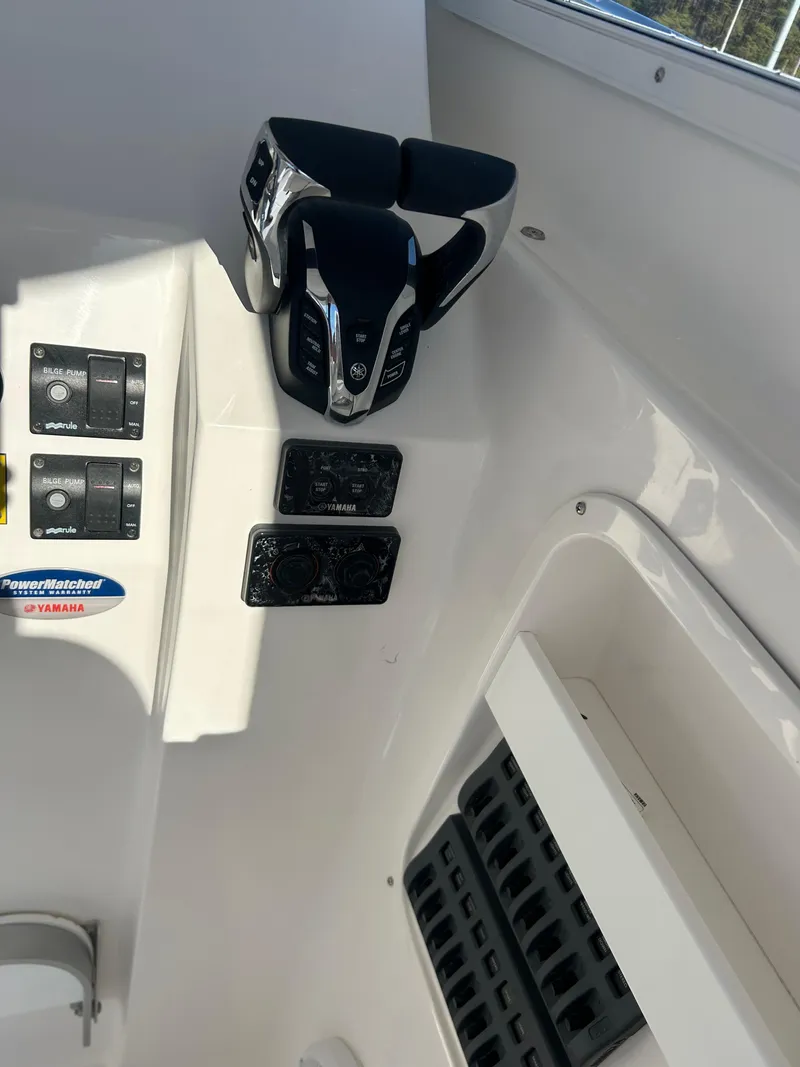 Slide: The Image of 2024 NorthCoast 255HT boat controls and dashboard with Yamaha components. - 42