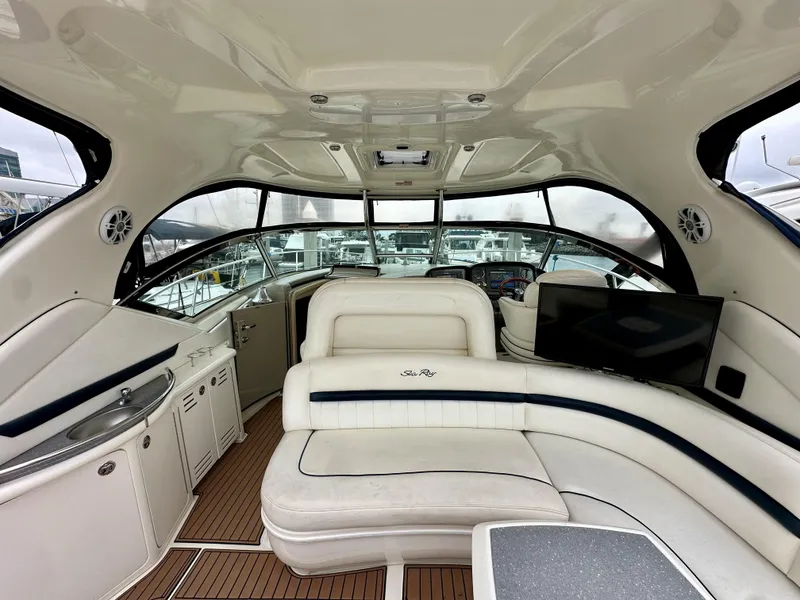 Slide: The Image of Luxurious interior of a 2006 Sea Ray 44 Sundancer yacht with plush seating and modern amenities. - 10
