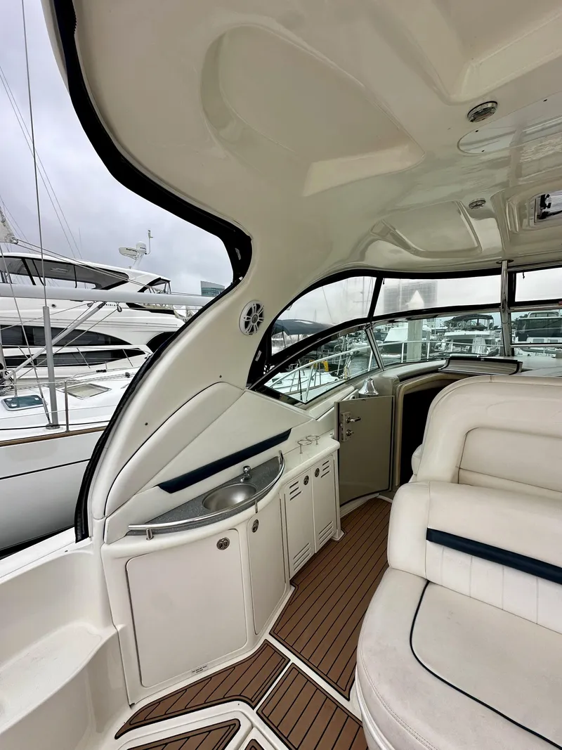 Slide: The Image of Interior of 2006 Sea Ray 44 Sundancer yacht with sleek design and comfortable seating. - 11
